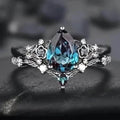 2-Piece Set: Gothic Black & Golden Engagement Ring Set with Pear-Shaped Cubic Zirconia